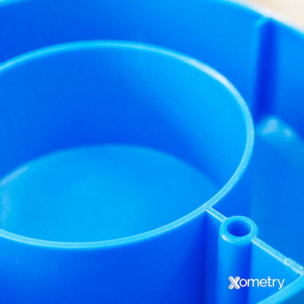 An injection molded part with even walls